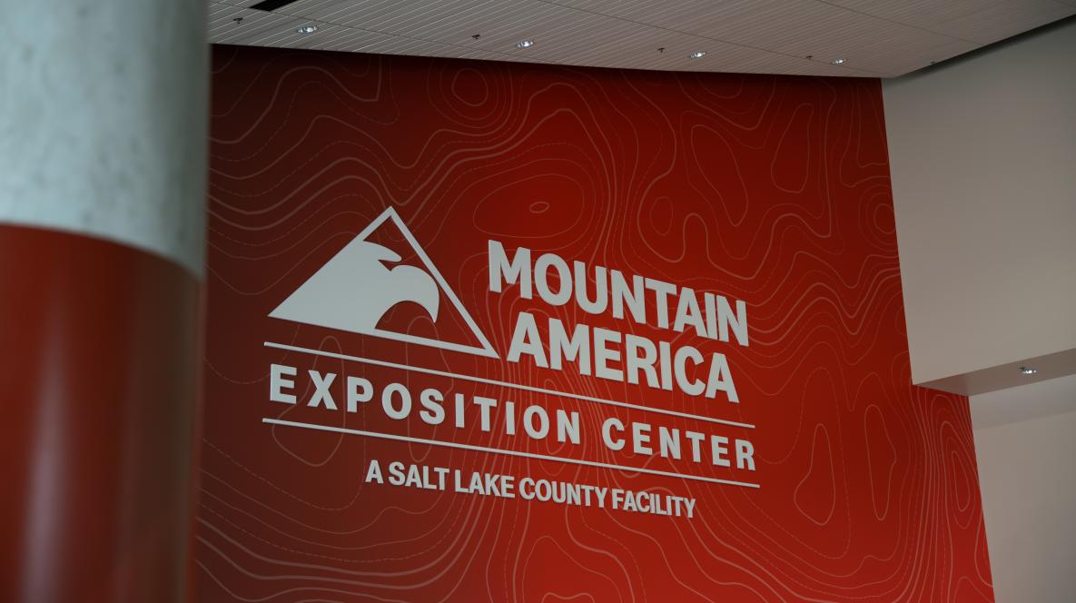 Photo of the Mountain America Expo Center logo inside the facility.