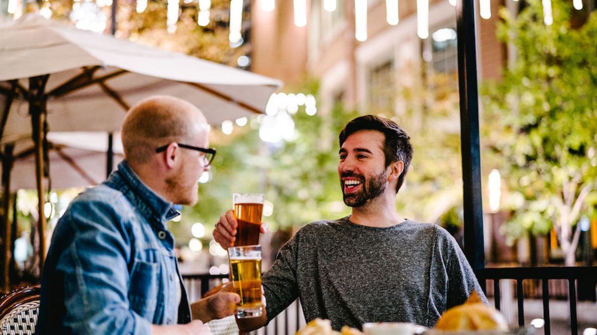 Friends Hanging Out Having A Beer