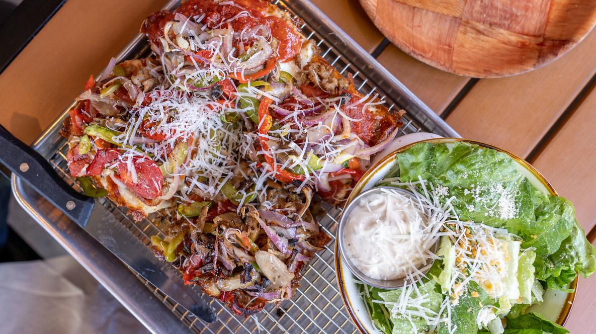 Pizza and salad at Bricks Corner