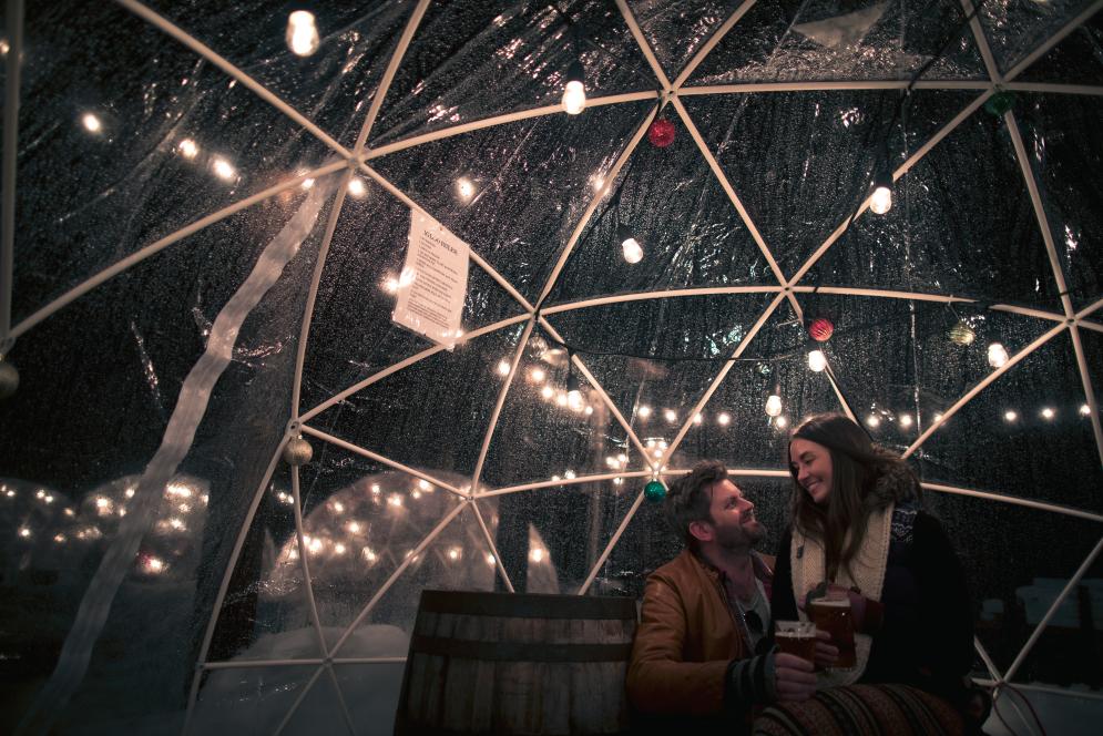 Couple in Hop lot Igloos