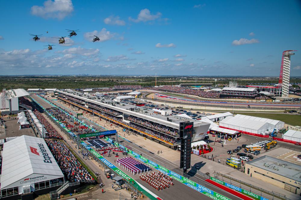 Aerial view of the COTA Formula 1 race track with fans.
