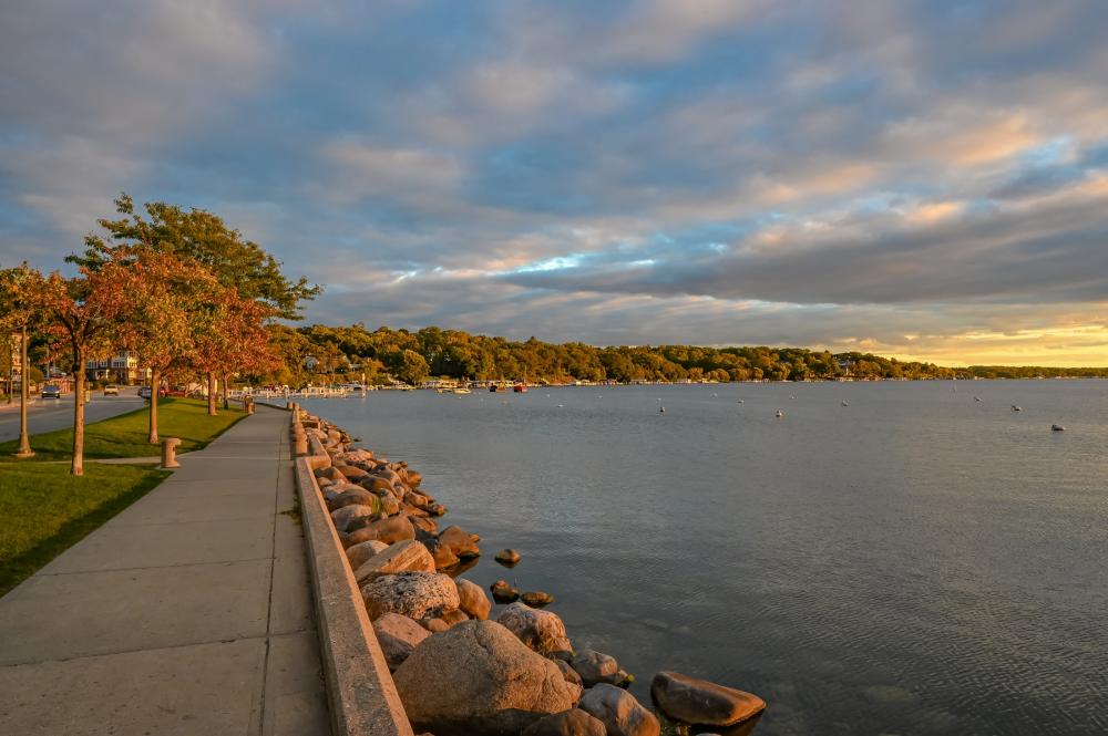 Lakeshore path in front of Library Park at sunset in Lake Geneva