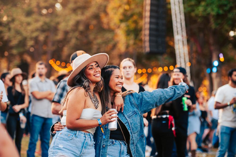 Two girls taking a selfie at GoldenSky Country Music Festival