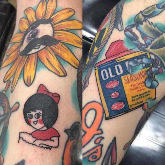A close up of tattoos of natty Bo, Utz girl and Old Bay Seasoning