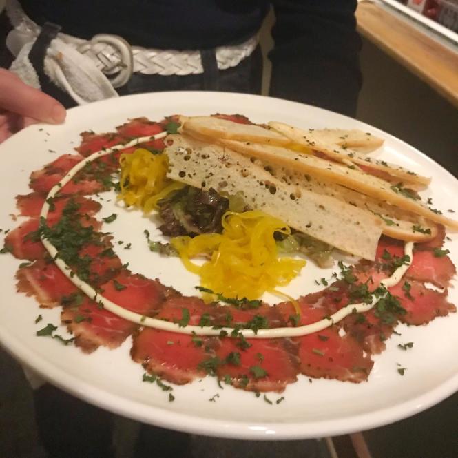 Beef Carpaccio a la Fox's Den gastro pub, served with crispy toast points