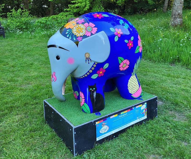 An elephant painted to resemble Frida Kahlo