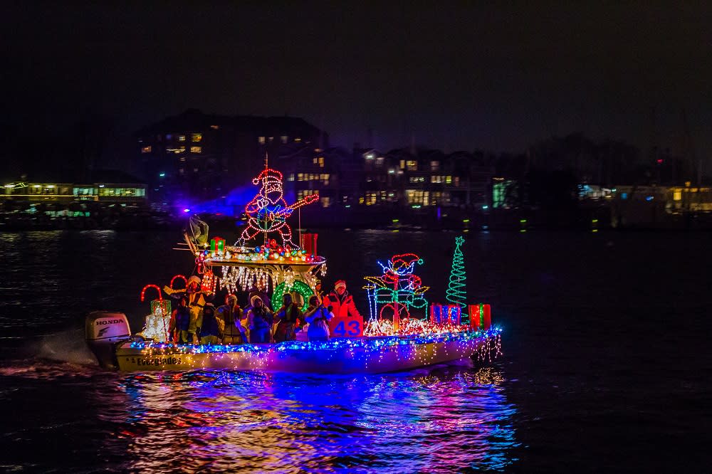 Boat Filled with Christmas Lights at Night