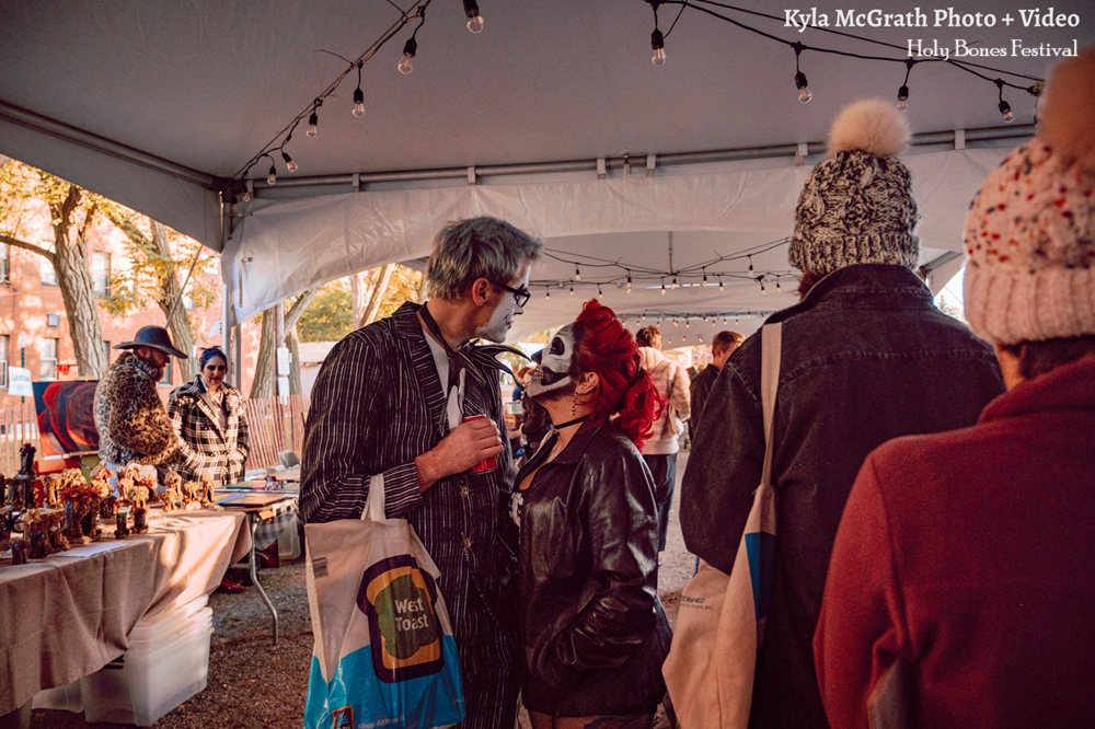 Couple embraces at holy bones festival
