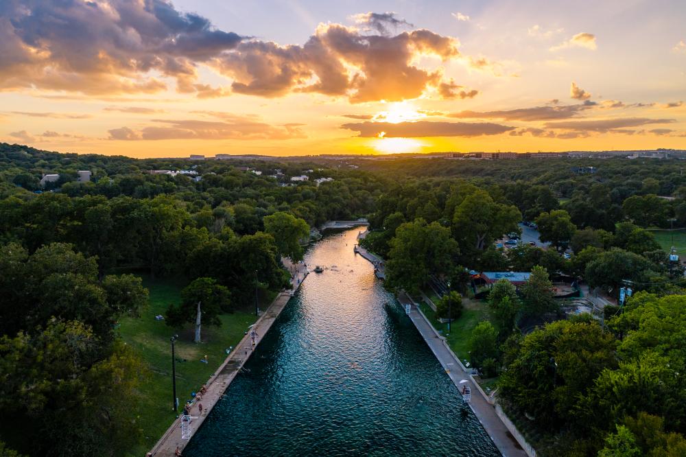 Aerial view of Barton Springs Pool at Sunset in Austin Texas