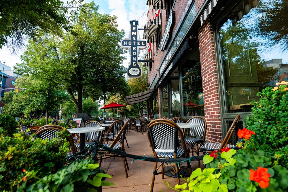 ace cafe patio with flowers surrounding it