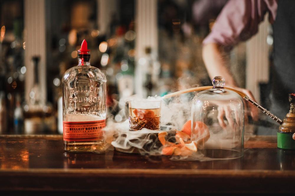 A smokey cocktail at the Maxwell Mansion