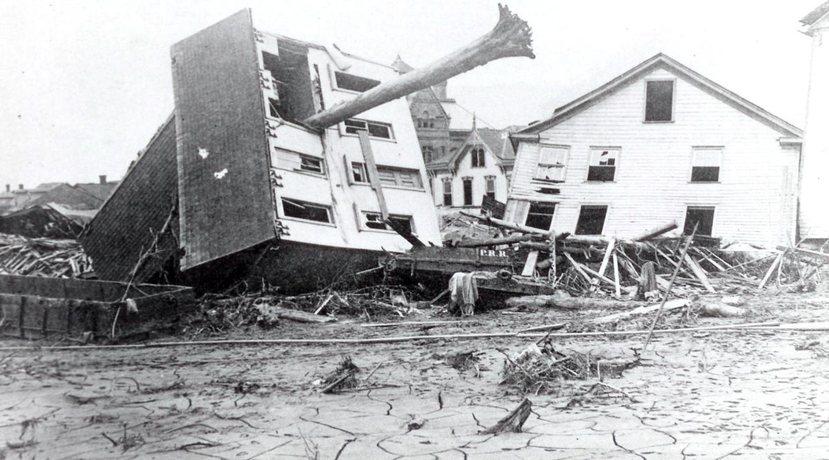 A tree juts from a second-story window of a home destroyed by the Johnstown Flood of 1889.