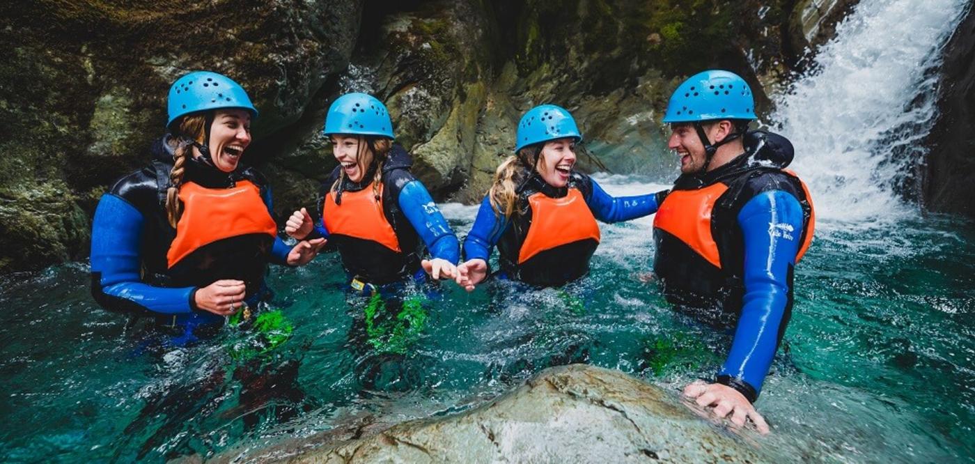 Group of four people in the routeburn canyon