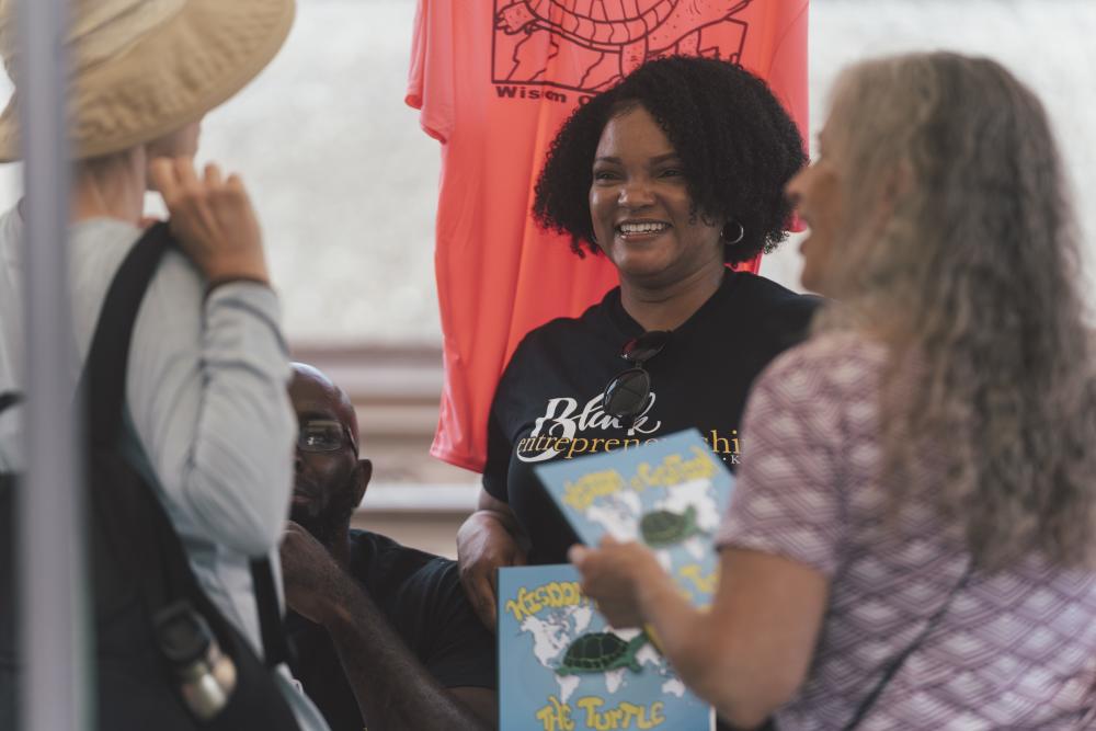 Woman smiling at GRINDfest event