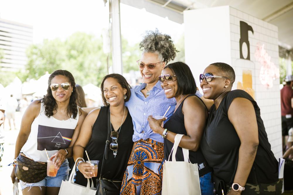 Four women pose with chef at Austin Food and Wine Festival