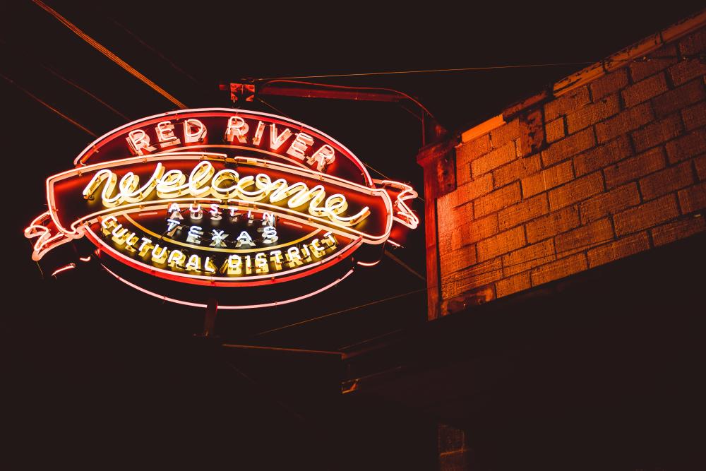 Neon Red River Cultural District Sign