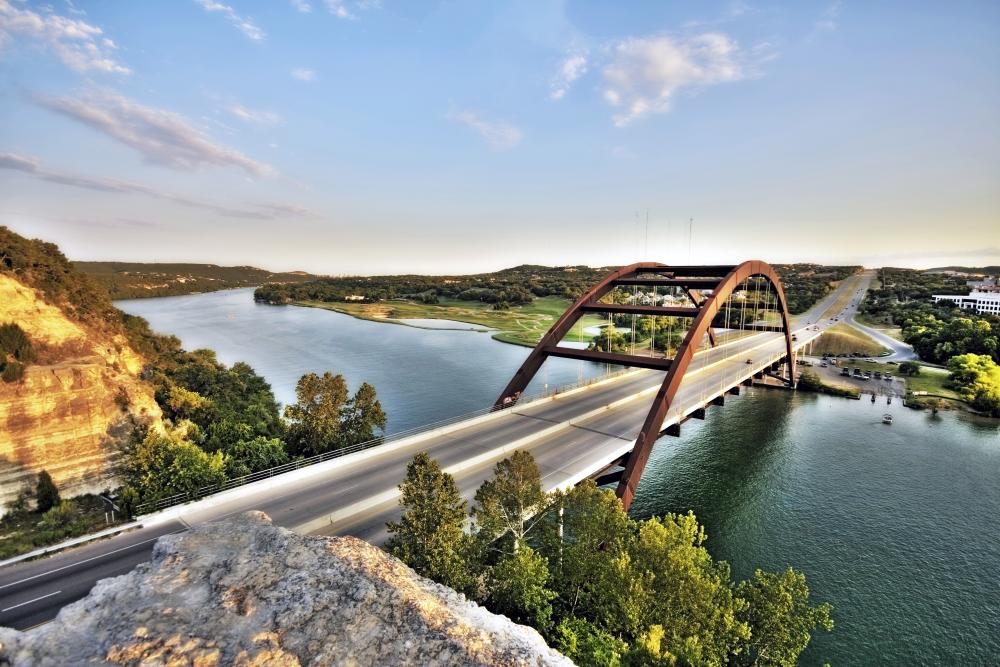View of Lake Austin and 360 Bridge from the scenic overlook, also showcasing downtown and Hill Country veiws.