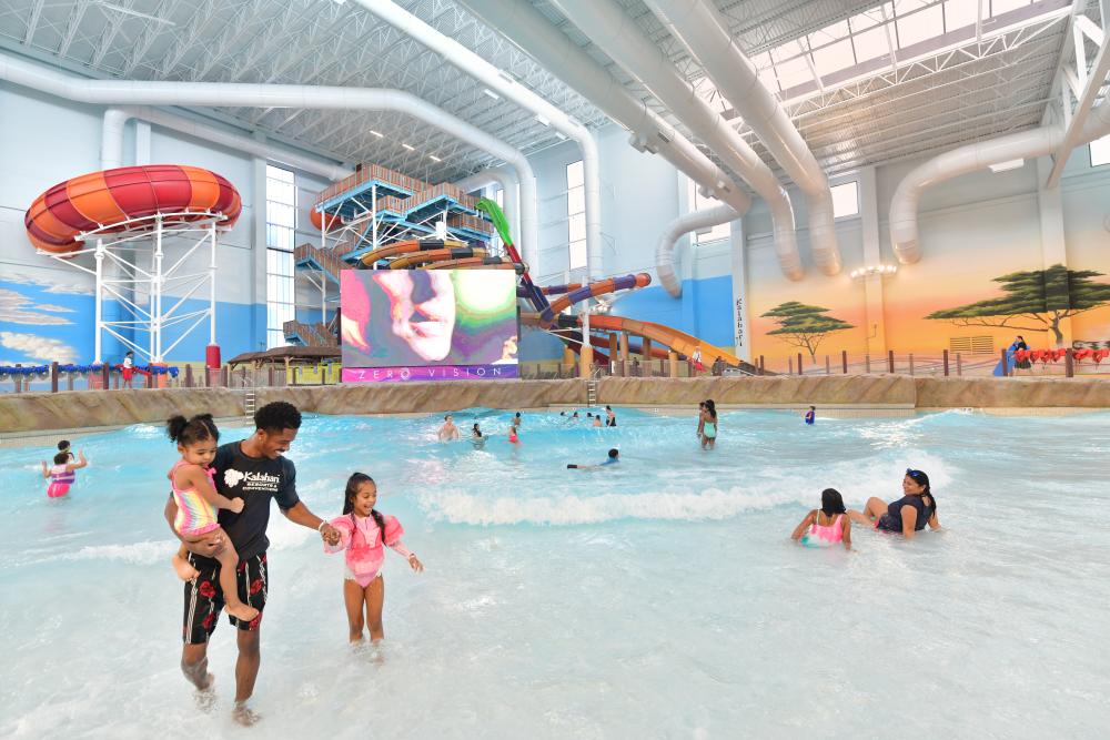 Family plays at the indoor waterpark at Kalahari Round Rock Texas