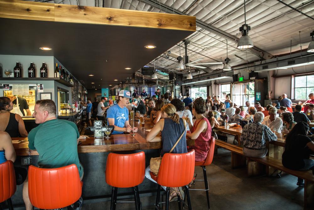 The Austin Beer Garden Brewing Company bar with visitors