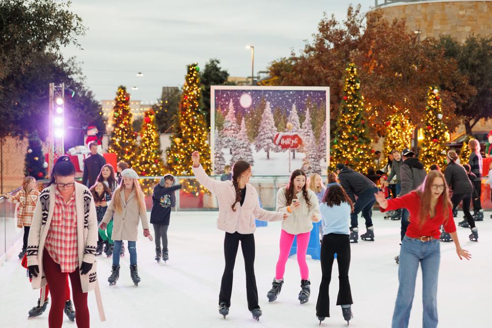 A mix of kids and adults ice skating at the Hill Country Galleria.