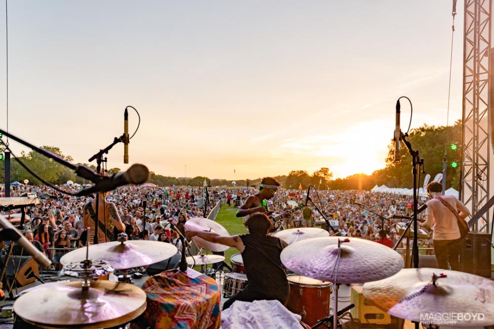 band on stage looking towards audience at Blues on the Green in austin texas