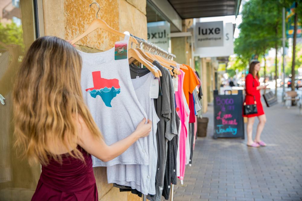 woman shopping at luxe apothetique in 2ND Street District in austin texas