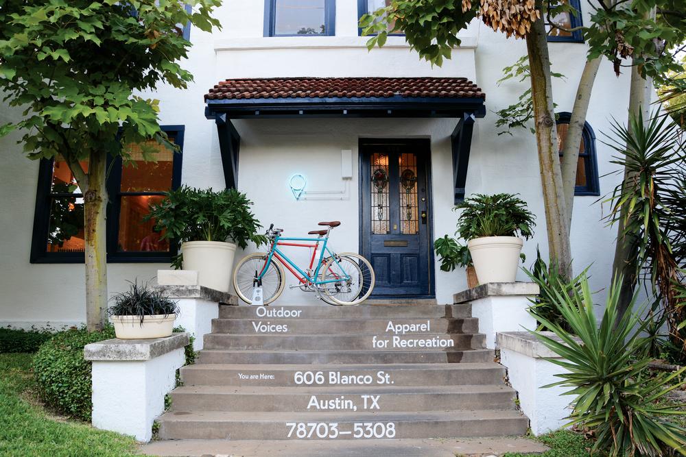 Outdoor Voices storefront with bike