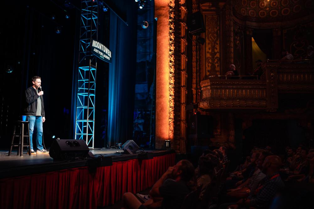 Image of Dan Soder performing at the Paramount Theater during Moontower Comedy Festival.