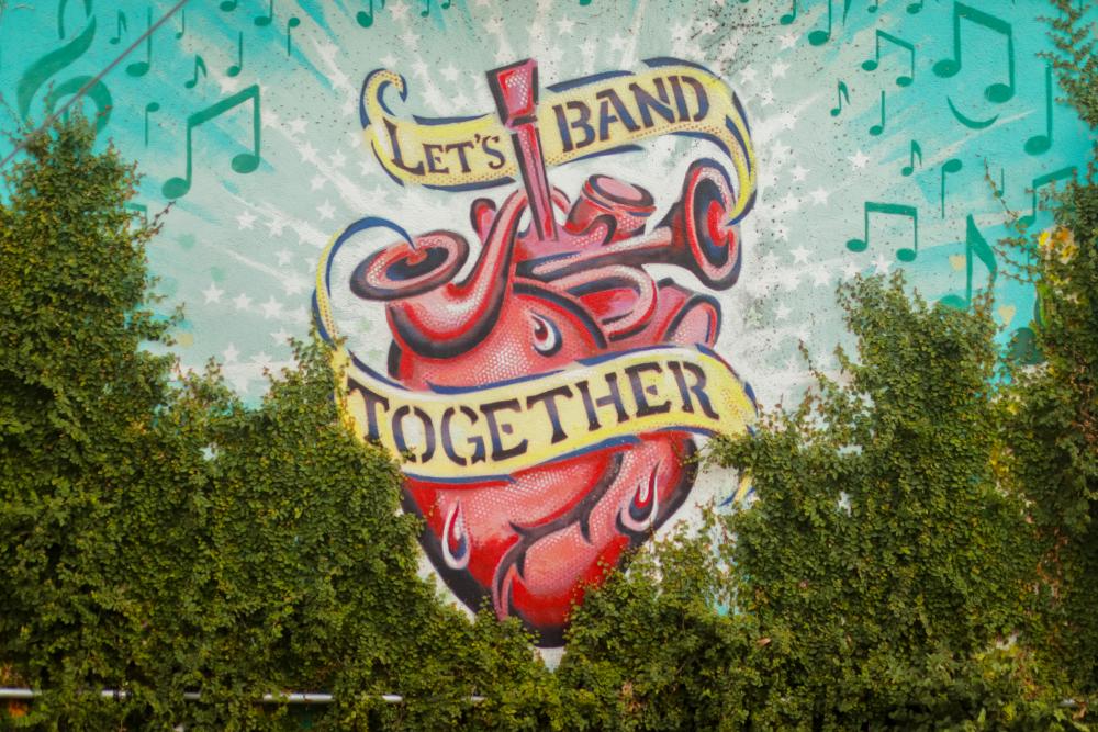 Federico Archuletas Lets Band Together Mural in Austin Texas