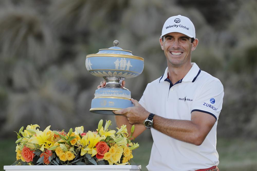 Horschel holding up the World Golf Championships-Dell Technologies Match Play trophy.