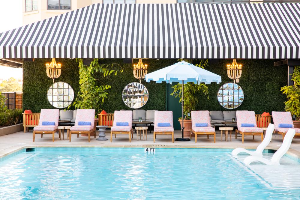 Pool and poolside chairs at Hotel Zaza In Austin, TX