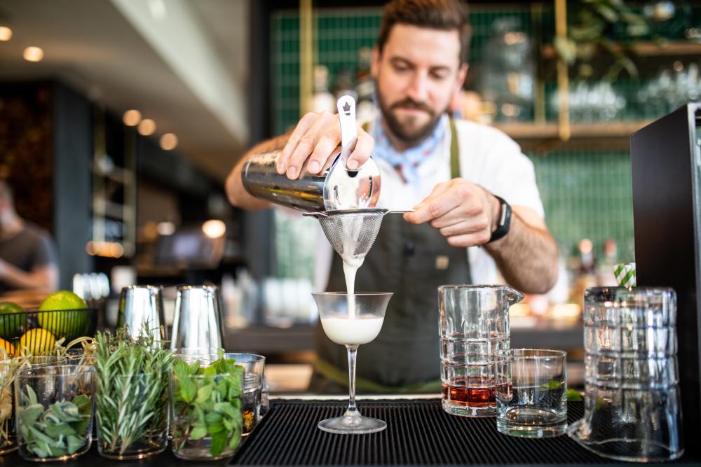 Bartender making a cocktail at Kalimotxo in Austin Texas