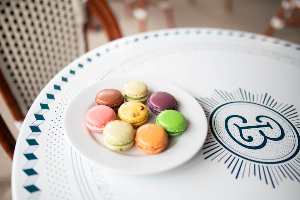 Colorful Macarons on a table at Bakery Lorraine