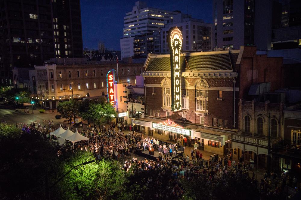 Paramount Theatre exterior at night with crowd