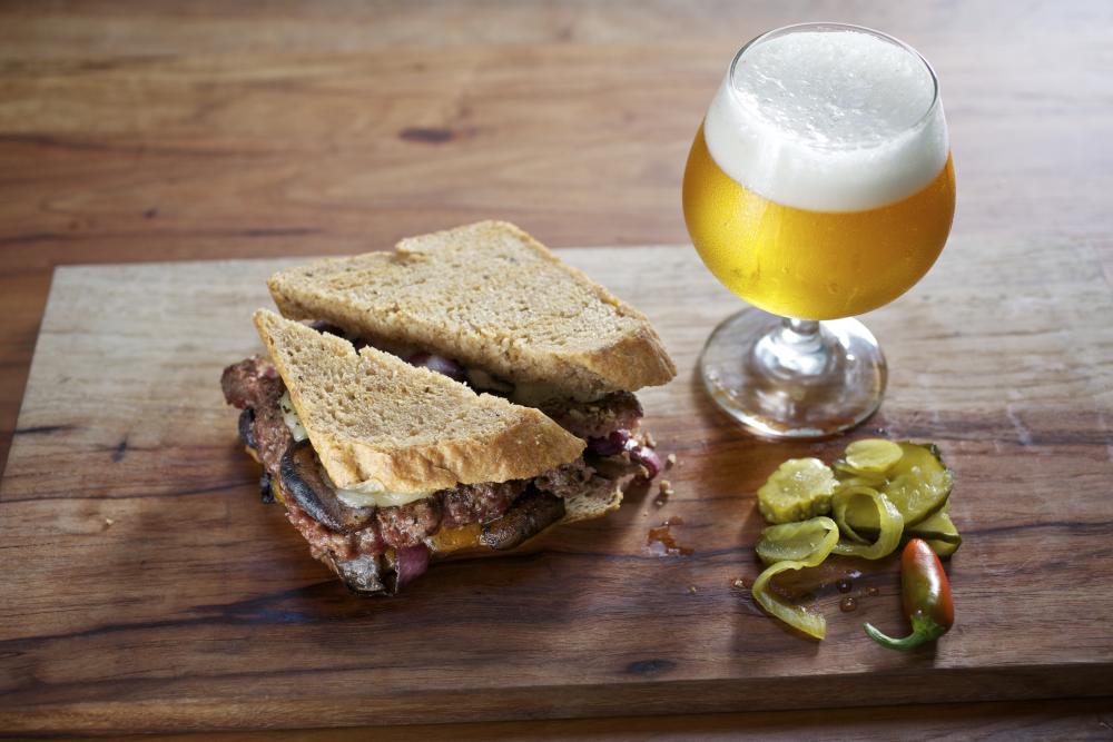 Dai Due Patty Melt with beer in tulip glass