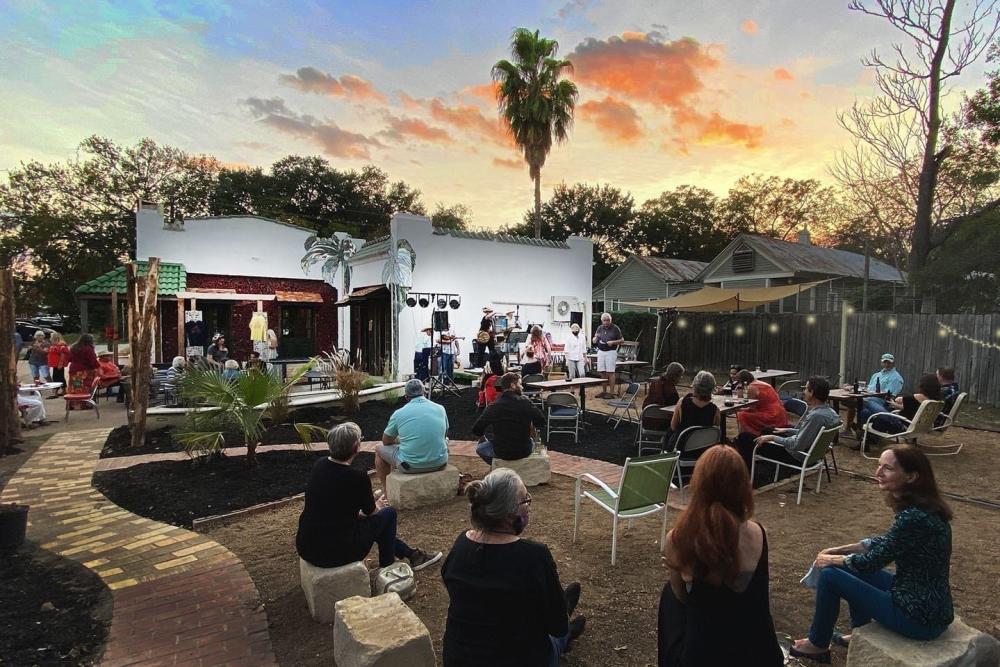 Rio Social House patio with live music at sunset in Smithville Texas