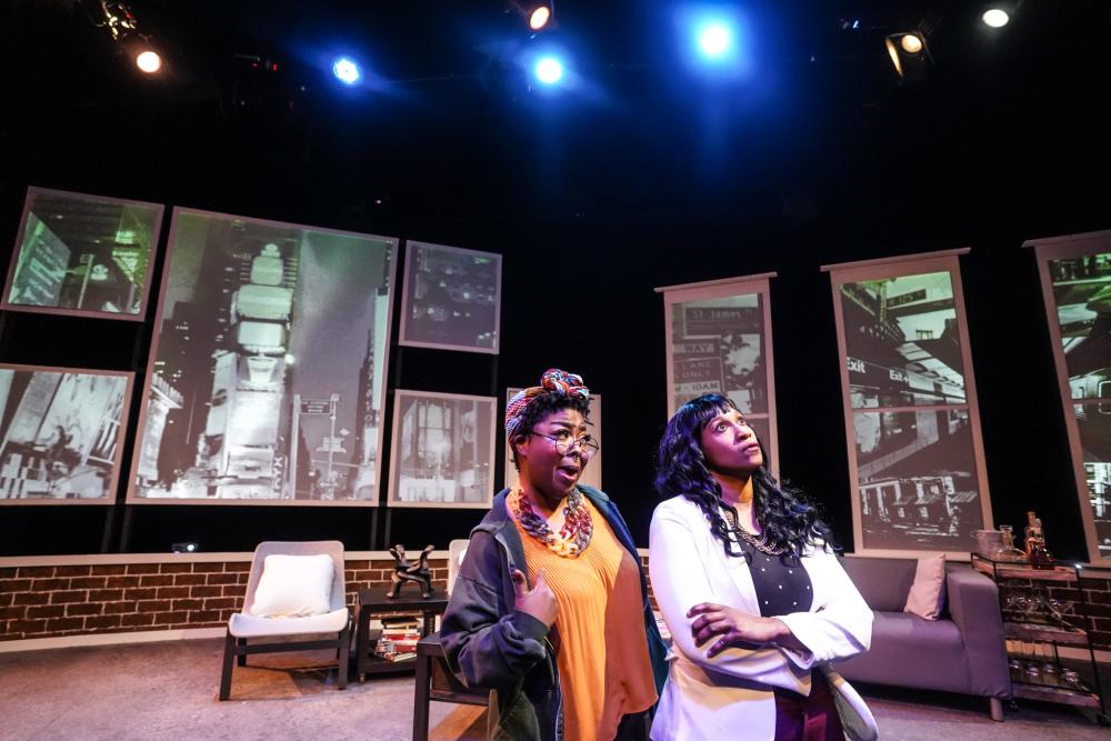 Two female actors on stage during a performance of Single Black Female at Ground Floor Theatre