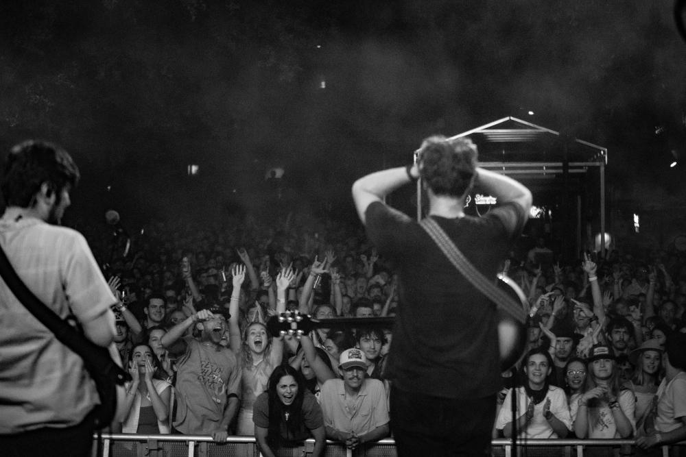 The Brook & The Bluff looking out at a crowd of cheering fans at the Stubb's Waller Creek Amphiteater.
