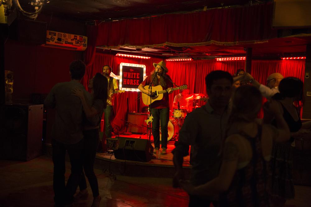 Patrons dancing at the White Horse bar and venue in Austin Texas