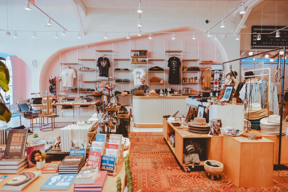 Modern clothing and merchandise displays at the Austin Visitor Center.