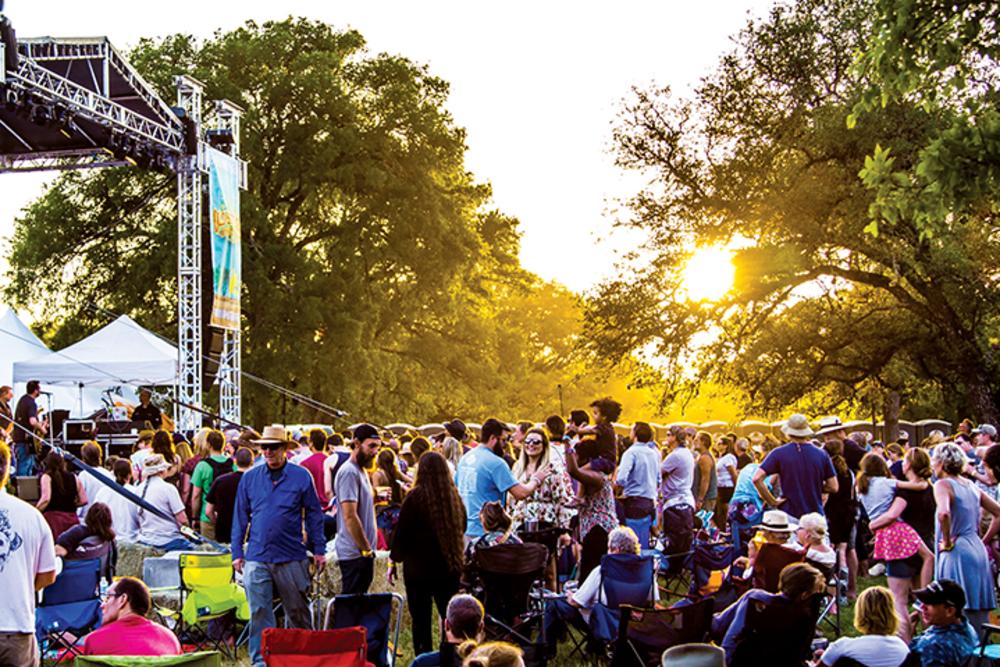 Old Settlers Music Festival stage with setting sun