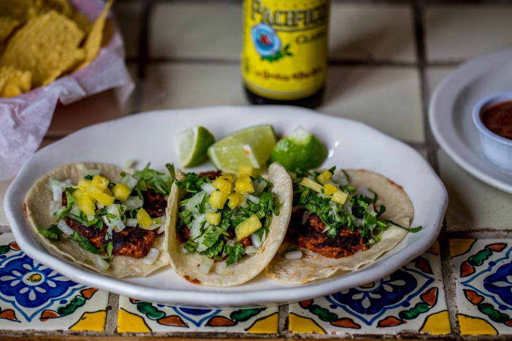 three Soy Al Pastor tacos at Gueros