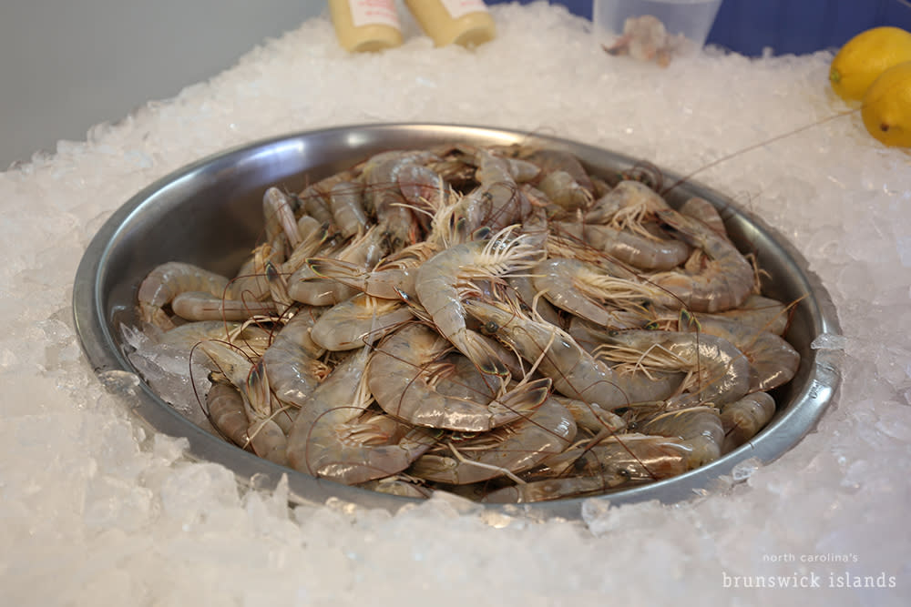 bucket of raw shrimp on ice