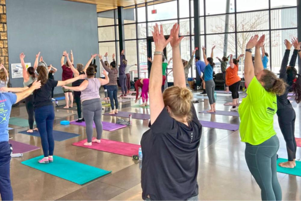 Individuals participating in a yoga class