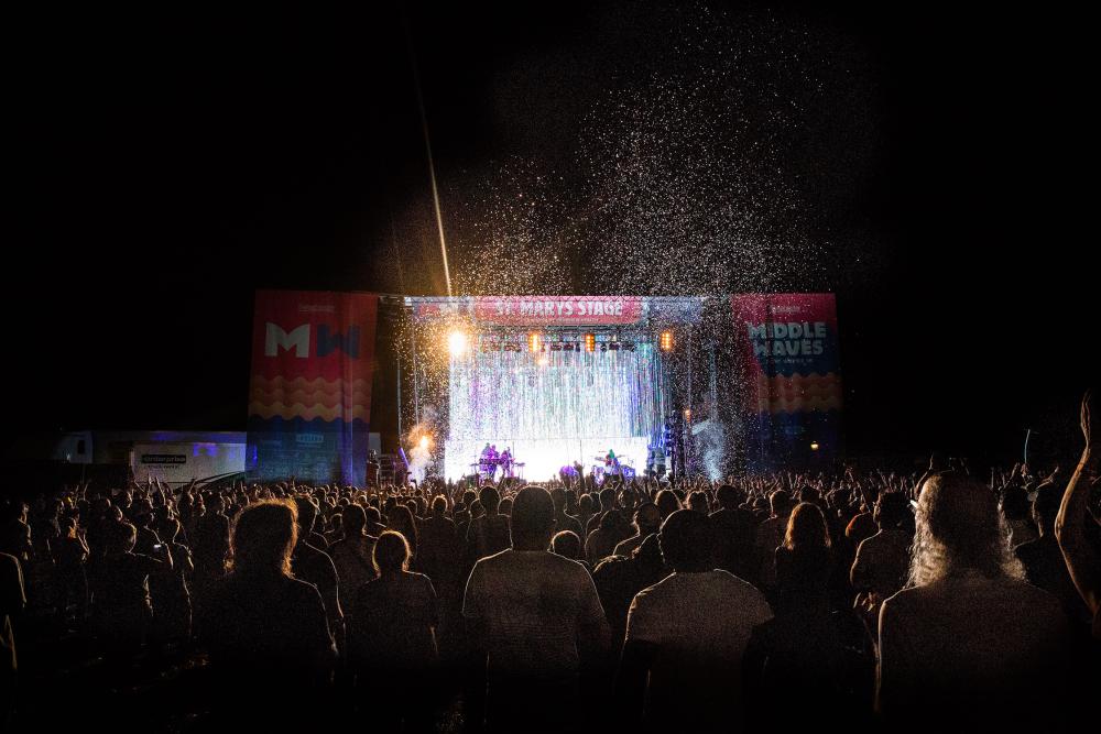 Crowd enjoying the headliner at Middle Waves Music Festival