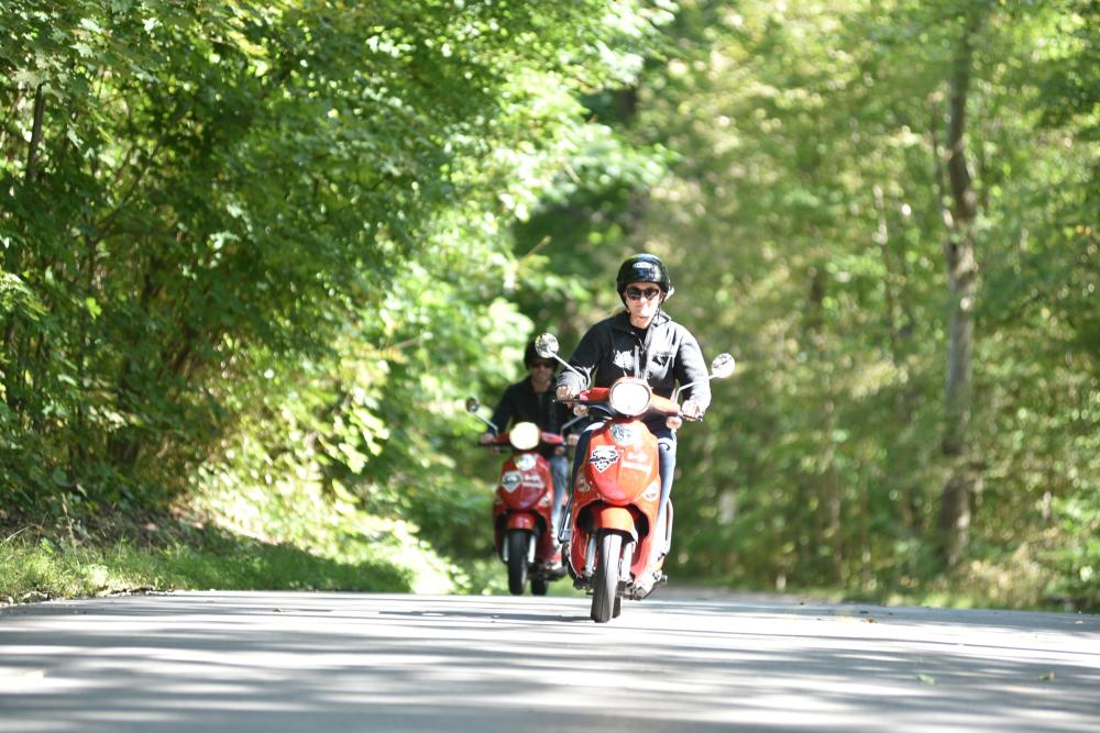Scooters on snake road