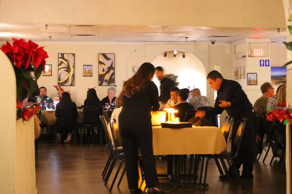 People inside Desert Moon, a restaurant in Palm Springs