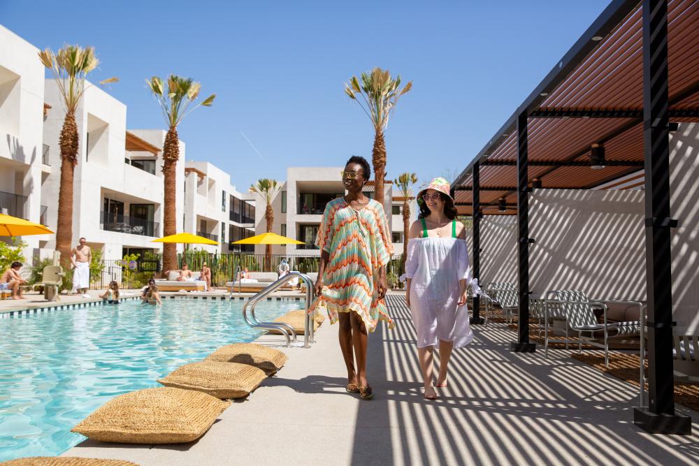 Two women poolside at the Drift Hotel
