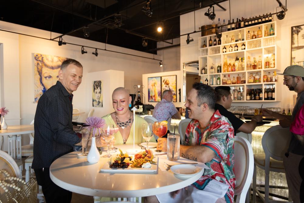 Gay couple dinining at 849 in palm springs