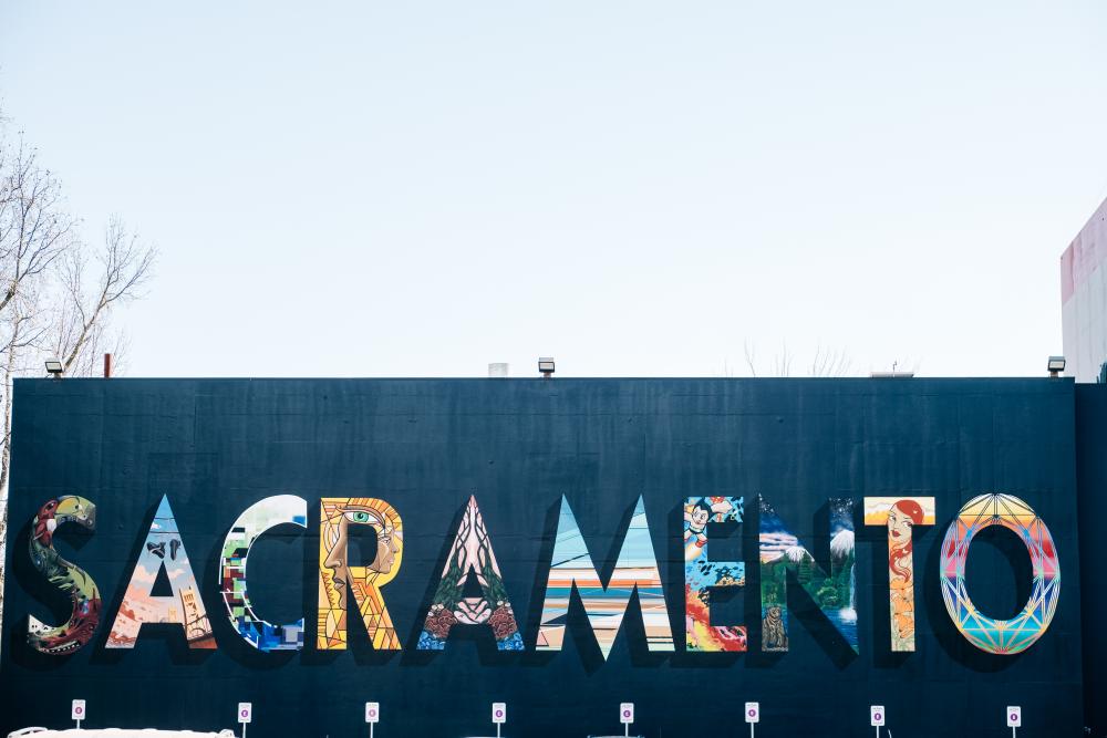 The Sacramento Mural on the side of Shasta Hall at Sacramento State University. Each letter was painted by a different artist